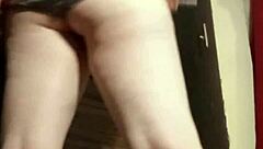 Camgirl in Grey Teases with Sensual Ass Fingering