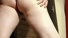 Camgirl in Grey Teases with Sensual Ass Fingering