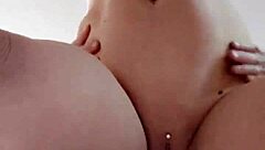 The amateur couple gets heated in the bedroom as he takes her pierced pussy from behind in intense doggystyle sex