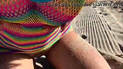 Do you want to see this beautiful blonde milf with big ass and tits on the beach?