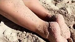 Do you want to see this beautiful blonde milf with big ass and tits on the beach?