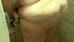 curvy bbw wife gets spotted rinsing off solo in that steamy shower setup