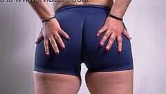 she starts her routine with careful stretches in the room focusing on colombian curves and short hair