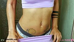 Elegant tall brunette took a shower after her photoshoot on the sofa