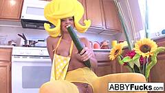 abigail gets creative in the kitchen with her giant cucumber during surreal dress up