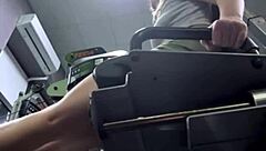 in the gym locker room, a horny teen beauty massages her shaved pussy on the bench until she squirts everywhere