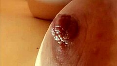 Gretala gently pinches her nipple in a moment of quiet self-exploration with big natural tits