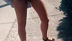 Boldly stripping naked on the busy street for public thrill