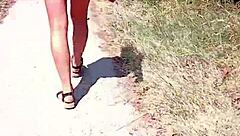 Boldly stripping naked on the busy street for public thrill