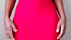 This sexy African lady teases by revealing her alluring tits