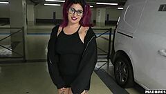 A slutty Chilean with big tits and glasses gets her curvy ass pounded doggystyle by a big black cock in a public parking lot.