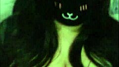 a goth girl teases her massive tits live on webcam.