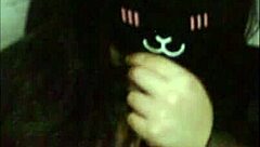 a goth girl teases her massive tits live on webcam.