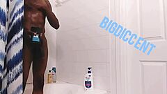 Guy strokes big dick in shower off the clock