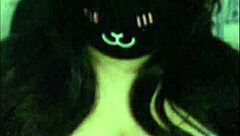 a goth girl teases her massive tits live on webcam.