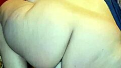 Pussy lips part wide gripping that thick dildo deep inside teasing every wet fold slowly.