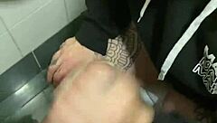 blonde slut deepthroats in public cinema bathroom?