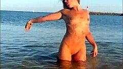 kleo furiosa shows off tight pussy and small tits on sunny beach