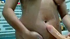 stepmom sneaks dildo play in bathroom shadows teasing her tight hole