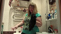 Chubby MILF sniffs panties then stuffs them in hairy pussy