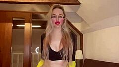 Goddess in glasses dances her huge belly while dominating with blowjob fetish tune