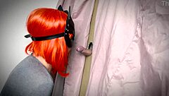 ginger amateur spots the gloryhole and starts teasing with her homemade blowjob skills