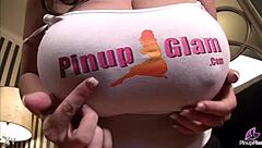 Busty September Carrino bounces and squeezes her massive heaving tits closeup