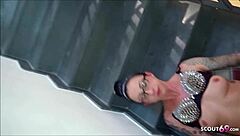 Skinny tattooed german milf mommy with glasses rims licks balls and takes facial cum on the stairs.