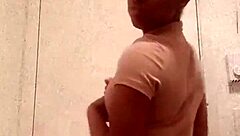 wanna see this black girl flash her chocolate ass in the bathroom?