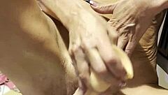 Watch this sexy blonde wife oil up for big dildos solo play