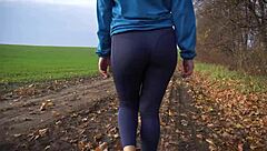 Milf shakes nice ass in tight pants from behind