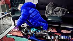 bound tight in three layers of tape over kigurumi catsuit