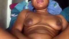 black ebony slut fingers her pussy rough till she cums hard.