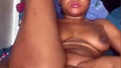 black ebony slut fingers her pussy rough till she cums hard.