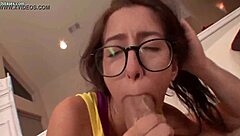 a babe with glasses teases and pleasures a large throbbing penis in steamy closeup action all the way