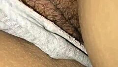 She plays with her smooth pussy in intimate close-up scene