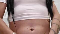 Emy Angel's wet t-shirt clings to every curve