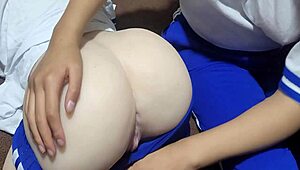 Students engage in a threesome after class, with stepsister licking the sex doll Candice's ass.