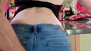 The horny wife got fisted on the kitchen counter while her husband watched in the homemade video.